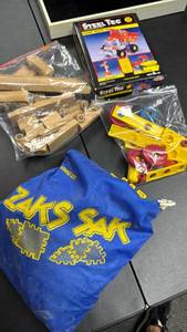 lot 141 image: Steel Tec Dump Truck Construction Set and a bag of Zaks Sak wooden cars and track set