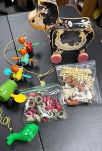 lot 142 image: Mixed Lot Childrens Vintage Toys - Pull-Along Wood Cow, Wood Bug Figure Pull Along, Farm Animals, Wood Checkers and a Plastic Wind Up Dinosaur