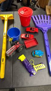 lot 144 image: Childrens Toy Lot  - Die Cast Vehicles, Buckets, Rakes, Water Gun, and Airplane