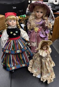 lot 151 image: Lot of 3 Porcelain Dolls with Blonde Hair and Dressed in Formal Outfits