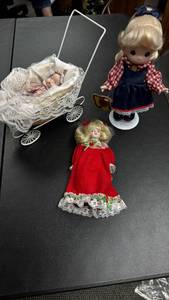 lot 154 image: Precious Moments Dolls, Doll in Baby Carriage, and a Porcelain Doll with red dress
