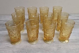 lot 401 image: Set of 12 Amber Textured Glass Footed Tumblers