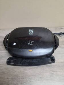 lot 425 image: George Foreman Lean Mean Fat Grilling Machine Countertop Grill
