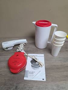 lot 427 image: Nostalgia MyMini Waffle Maker, White Plastic Pitcher with cups, and an electric handheld Can Opener