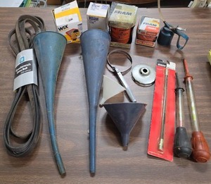 lot 943 image: Automotive Maintenance Tool and Filter Lot - Funnels, Belts, Oil Filters, Wrenches