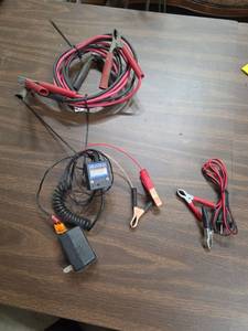 lot 946 image: Battery Float Charger and Jumper Cables