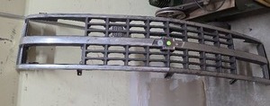 lot 965 image: 89-91 Chevy Grill Assembly with Chrome Surround and Dual Headlight Openings