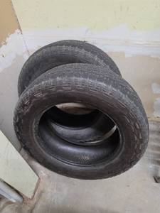 lot 966 image: 2 GoodYear Wrangler Tires 21560R20 - used but some treat life left - inspection recommended (text for appt time)