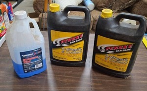 lot 970 image: Pronto Windshield Wash a little less than half full  Penske Antifreeze Coolant two gallons both sealed