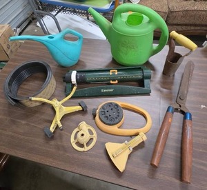 lot 1001 image: Garden Tool Lot Watering Cans, Hose, Melnor Sprinkler, Hand Tools