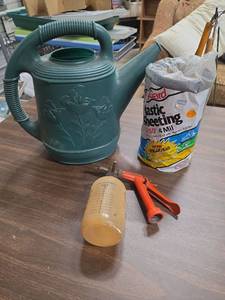 lot 1005 image: Watering Can, Plastic Sheeting, Spray Bottle and Pruner