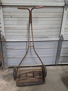 lot 1017 image: Vintage Push Reel Lawn Mower with Wooden Handles - heavy patina and seized up, would need maintenance