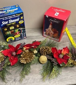lot 511 image: Star Shower Laser Light, Americana Porcelain Church, and Holiday Garland with Poinsettas and Pinecones