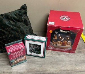 lot 512 image: Holiday Decor Lot Light Mini Star Electrical Treetop, The Cottage in the Glen, Light Holders, and Green Pillow