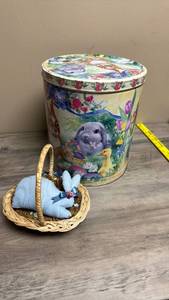 lot 515 image: Easter Decor - Metal Storage Tin with Animal Garden Scene and Wicker Basket with blue bunny