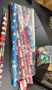 lot 517 image: Wrapping Paper and Bows lot