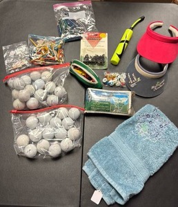 lot 751 image: Golf Lot Used Golf Balls, Tees, Spikes, Visor, Towels, Accessories