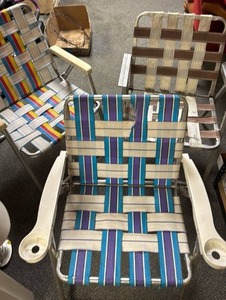 lot 767 image: Vintage Aluminum Folding Webbed Lawn Chairs - some webbing damage on two of them.