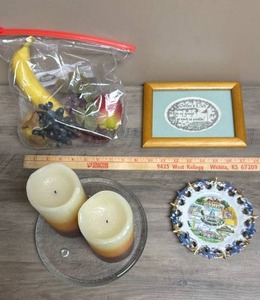 lot 538 image: Lot of Decorative Items - Candles, Plate, Golfers Diet Framed Art, and Plastic Fruit