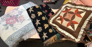 lot 600 image: 2 Throw Blankets - Floral and Seasonal Pattern w Fringed Edges and 1 quilted throw pillow