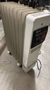 lot 610 image: DeLonghi Incredible Heat Machine Oil-Filled Radiator 1500W