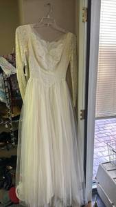 lot 700 image: Vintage Cream Lace Long Sleeve Formal Wedding Gown with Beaded Neckline