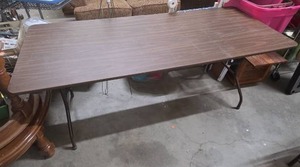 lot 18 image: Folding Table with Wood Grain Top and Metal Legs