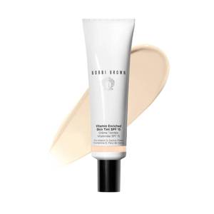lot 4144 image: Bobbi Brown Vitamin Enriched Skin Tint SPF 15  Broad Spectrum SPF Skin Tint  Hydrating Tinted Moisturizer  Vitamins B, C, & E, 1.7 Fl Oz, Medium 2 - Retail $49