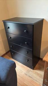 lot 1008 image: Black Four drawer Chest of drawers - 39 x 26 12 x 15