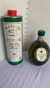 lot 1115 image: Frankies 457 Organic Extra Virgin Olive Oil 1L and Sancho Extra Virgin Olive Oil 25.5oz Lot