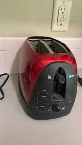 lot 1123 image: Oster 2-Slice Toaster Red Black