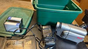lot 1303 image: RCA AutoShot Camcorder with Maxell Charger, ColorView Viewfinder, and Accessories all in Rubbermaid roughneck 3 gal tote