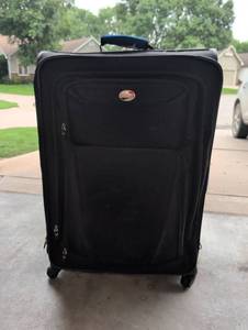 lot 2002 image: American Tourister Black Softside Luggage with 4 Wheels