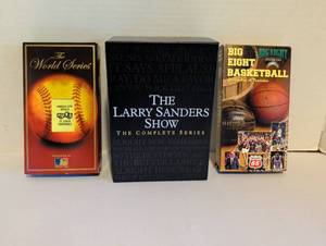 lot 2110 image: World Series VHS, Larry Sanders Show Complete Series DVD, Big Eight Basketball VHS