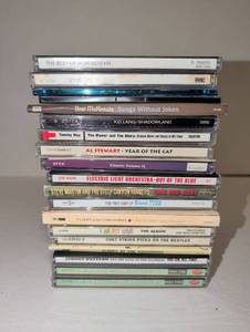 lot 2111 image: Lot of 18 Music CDs Don McLean, The Rutles, Bret McKenzie, K.D. Lang, Tommy Boy, Al Stewart, Styx, Electric Light Orchestra, Steve Martin, Ernest Tubb, Flight of the Conchords, The Who, Chet Atkins, Johnny Western, Dr. Demento