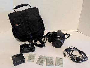 lot 2113 image: Nikon Digital Camera with Lowepro Bag, Batteries, Charger and Accessories