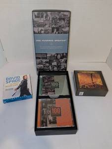 lot 2116 image: DVDs and cds with David Spade Memoir and Tom Lehrer