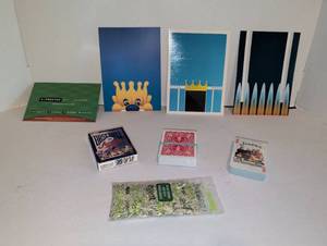 lot 2120 image: Mixed Lot of Playing Cards, Postcards and Shredded Currency