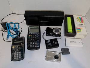 lot 2130 image: Electronics Lot TI-30Xa TI-83 Calculators Lumix Camera PowerJam Bank and more