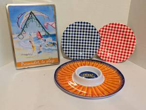 lot 2204 image: Plastic plates and tin