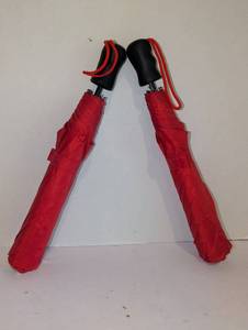 lot 2235 image: 2 Pack Red Compact Umbrellas with Black Handles and Red Cord Straps