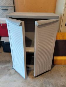 lot 2250 image: Black & Decker Storage Cabinet with Louvered Doors