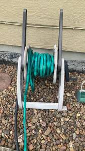 lot 3001 image: Garden Hose Reel with Green Hose