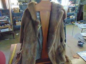lot 4608 image: Fur Coat with Wooden Stand