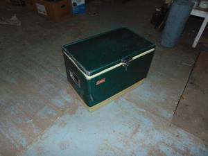 lot 4655 image: Metal Coleman Cooler with a dent