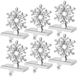 lot 5032 image: yofit 6 Pcs Christmas Snowflake Stocking Holder, Metal Christmas Stocking Hanger, 3D Sliver Stocking Hooks Non-Slip for Fireplace Mantel Window Christmas Home Xmas Party Decor - Retail $50