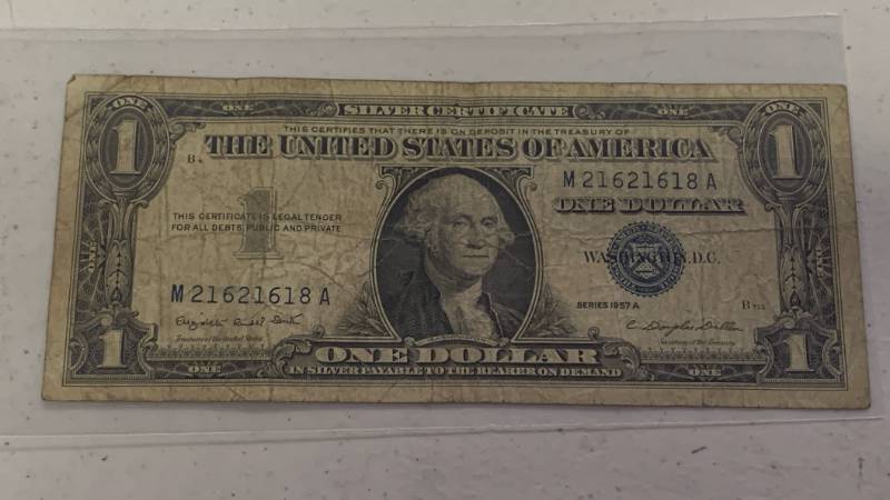 lot 11 image: One dollar silver certificate Blue Seal Series 1957 A - Serial Number M21621618A