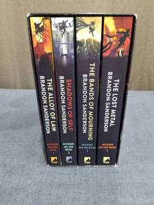 lot 721 image: Brandon Sanderson Mistborn Wax and Wayne 4-Book Box Set
