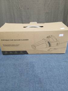 lot 736 image: Portable Car Vacuum Cleaner with DC 12V Power Cord and Filter