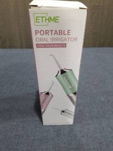 lot 1870 image: ETHME Portable Oral Irrigator